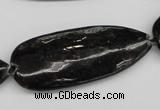 CAE72 15.5 inches 18*44mm flat teardrop astrophyllite beads wholesale