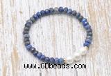 CFB773 faceted rondelle lapis lazuli & potato white freshwater pearl stretchy bracelet