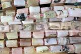 TUBE110 15 inches 6*11mm - 8*14mm faceted tube pink opal beads